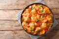 Recipe forÃÂ Chicken Mafe a West African stew with a peanut coconut sauce close-up in a plate. Horizontal top view